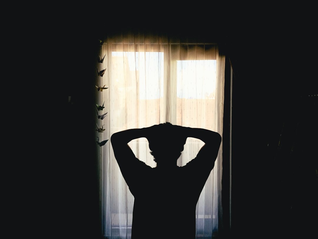 suspicious person in dark room