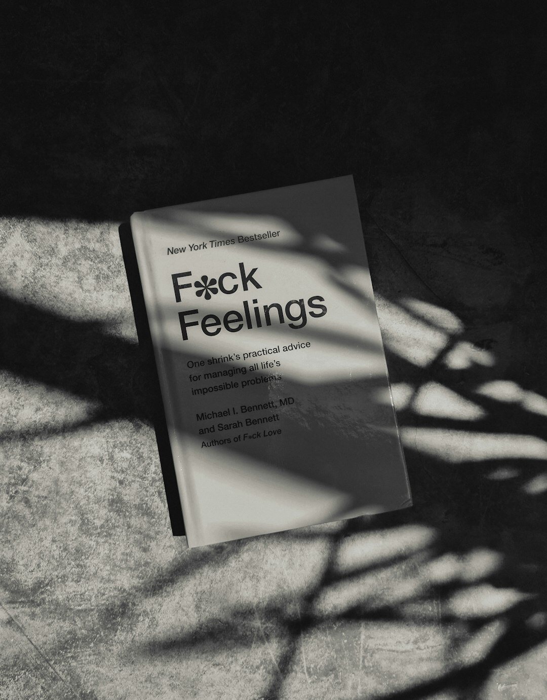 dark book cover with shadow