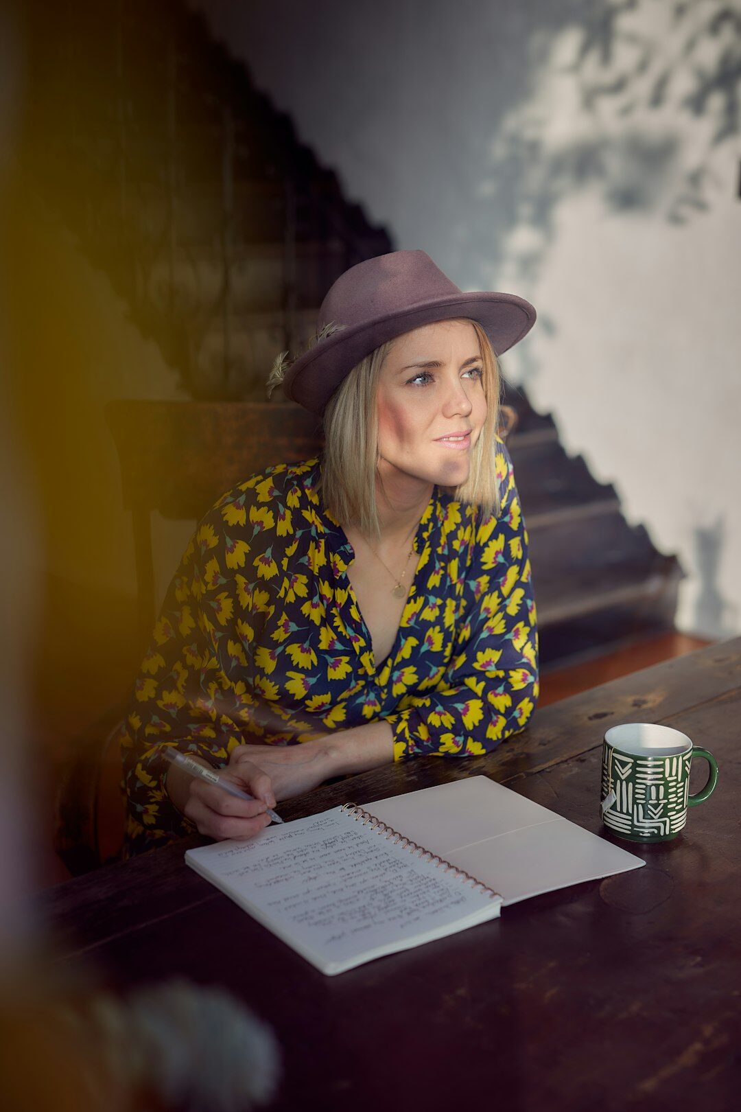 woman writing mystery novel